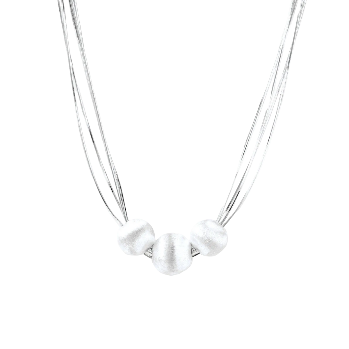 A delicate silver necklace featuring three textured, rounded silver beads suspended from thin, multi-strand silver chains against a solid white background.