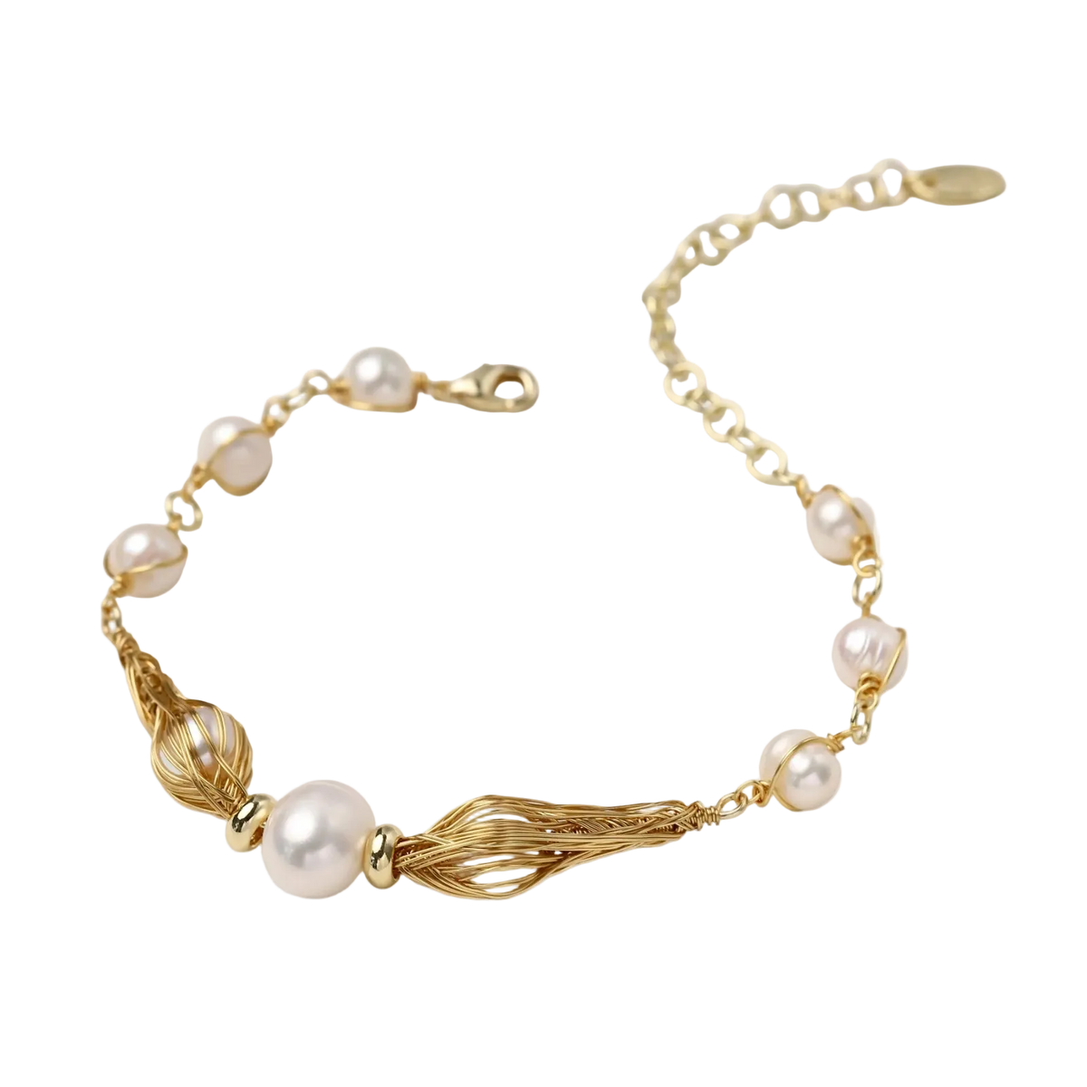 Adjustable gold bracelet with freshwater pearls and textured filigree beads on white background, showing clasp detail.