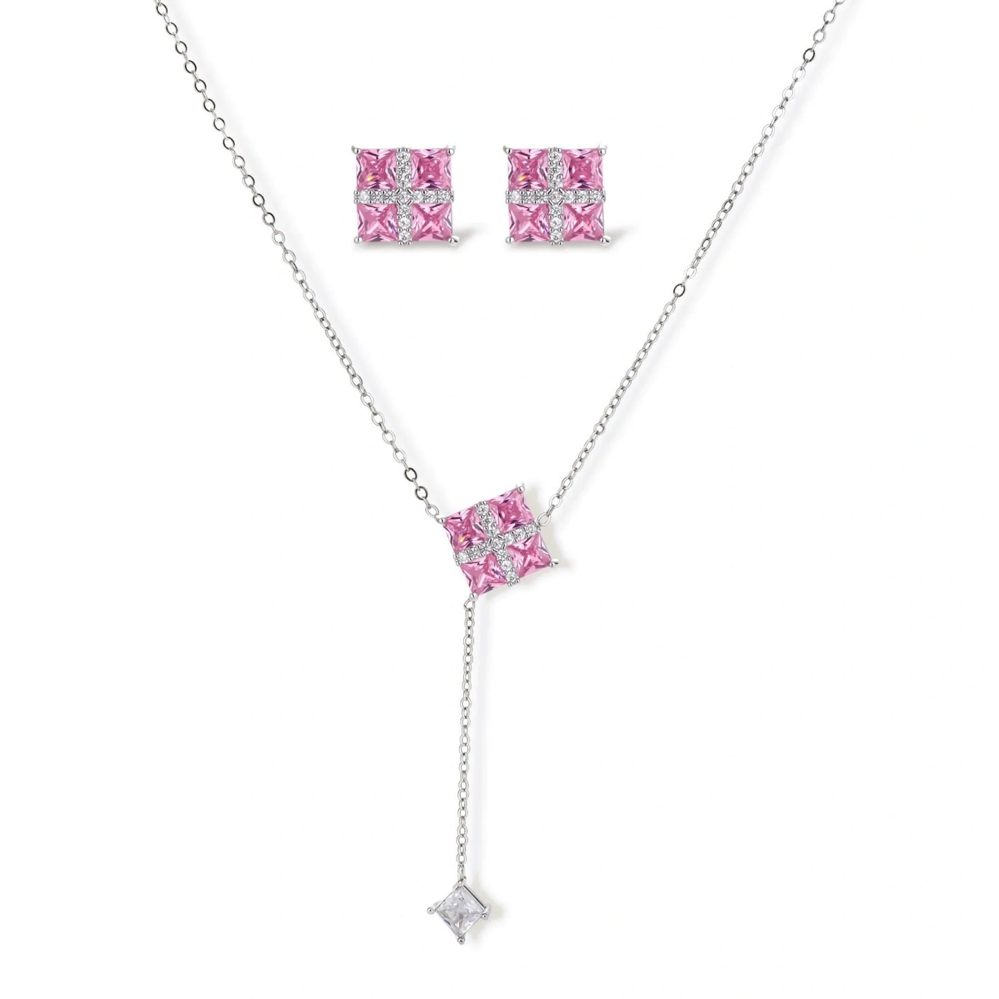 White gold plated jewelry set with pink cubic zirconia stones in geometric cross design, featuring Y-necklace and square stud earrings