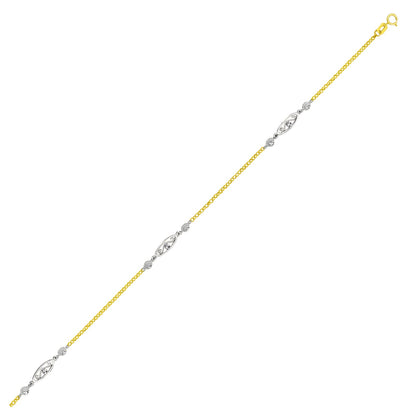 Two-tone gold and silver bracelet on a white background
