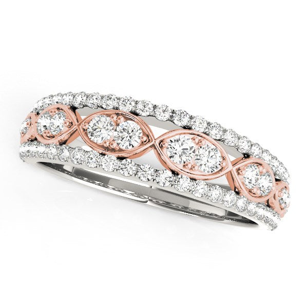 Rose gold and silver ring with diamond accents on a white background
