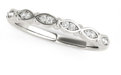 Silver ring with embedded diamonds on a white background