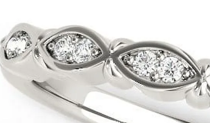 Silver ring with three diamonds on a white background