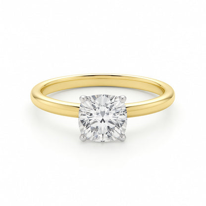 Gold ring with a diamond on a white background