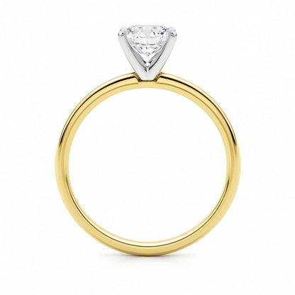 Gold ring with a diamond on a white background