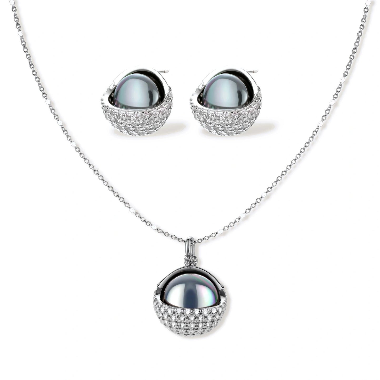 Silver gray Tahitian-style pearl pendant necklace and matching pave zirconia stud earrings set on cream background.