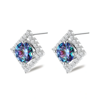 Diamond-shaped sterling silver stud earrings with rainbow moissanite centers surrounded by crystal halos