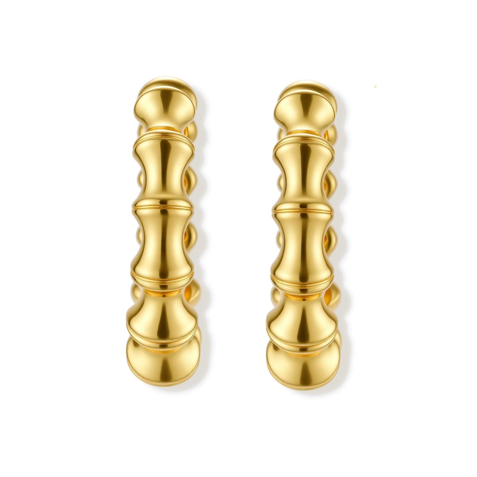 Close-up of gold-plated sterling silver hoop earrings with bamboo-inspired segmented design on white background.