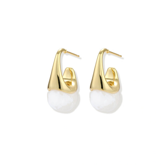 Sculptural Cone Drop Earrings — gold tapered teardrop hoop cradling white resin sphere, front flat lay