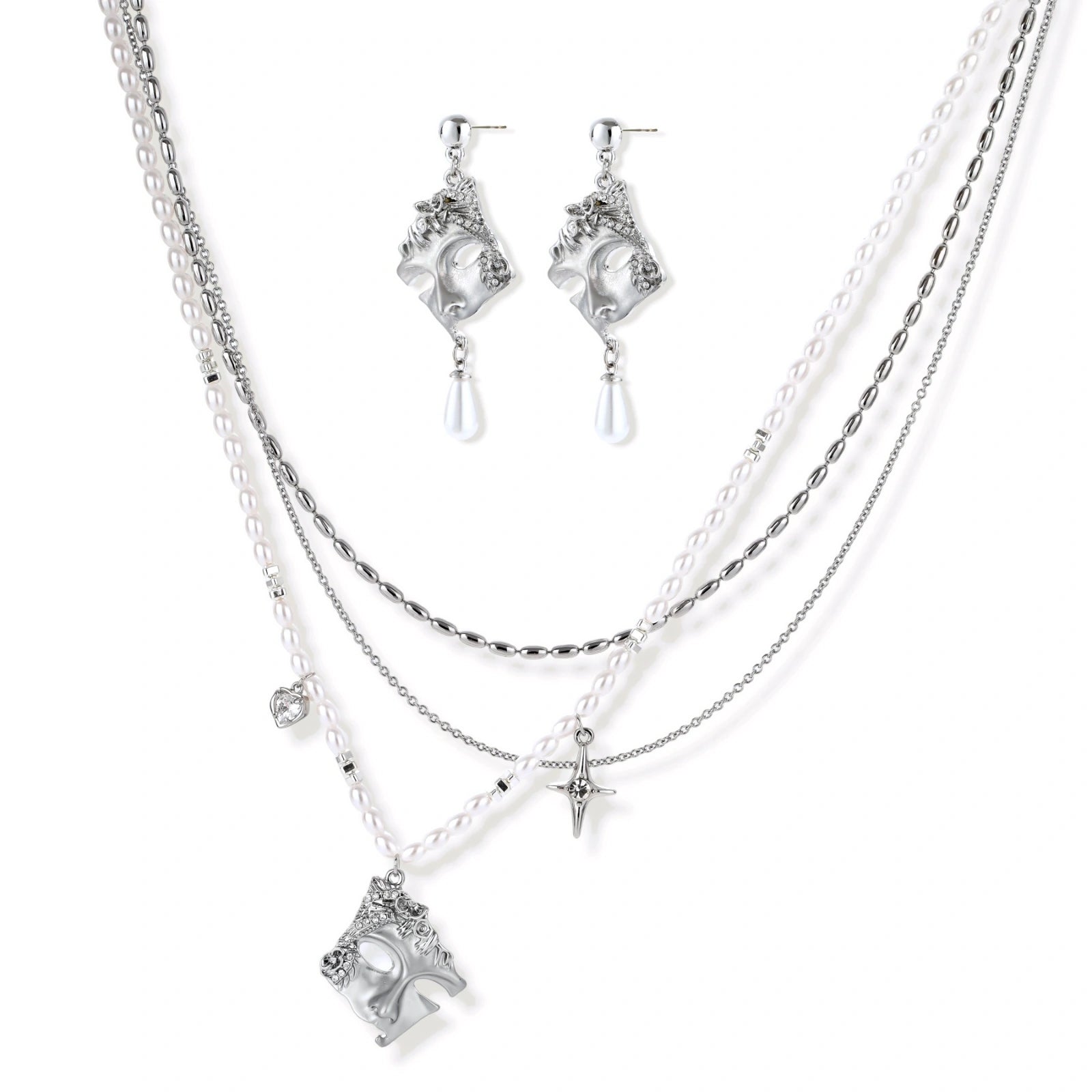 Ornate silver-toned masquerade mask jewelry set featuring rhinestone details and pearl drop earrings on white background.