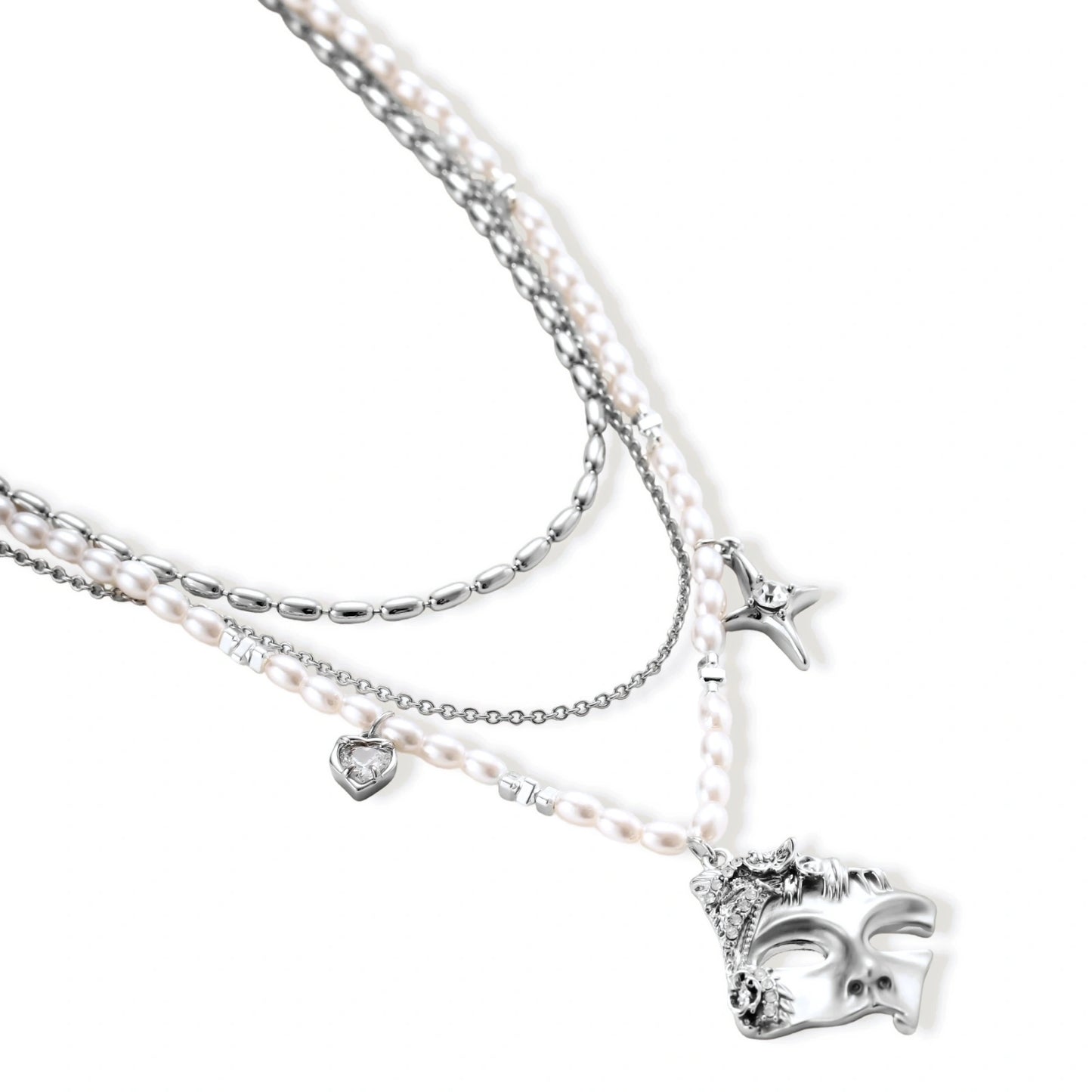 Ornate silver-toned masquerade mask jewelry set featuring rhinestone details and pearl drop earrings on white background.