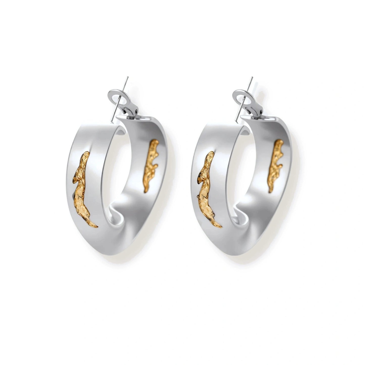 Artistic jewelry set featuring curved silver pendant with gold veining on black cord plus matching asymmetrical hoop earrings