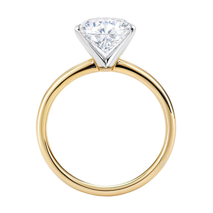 Gold ring with a diamond on a white background