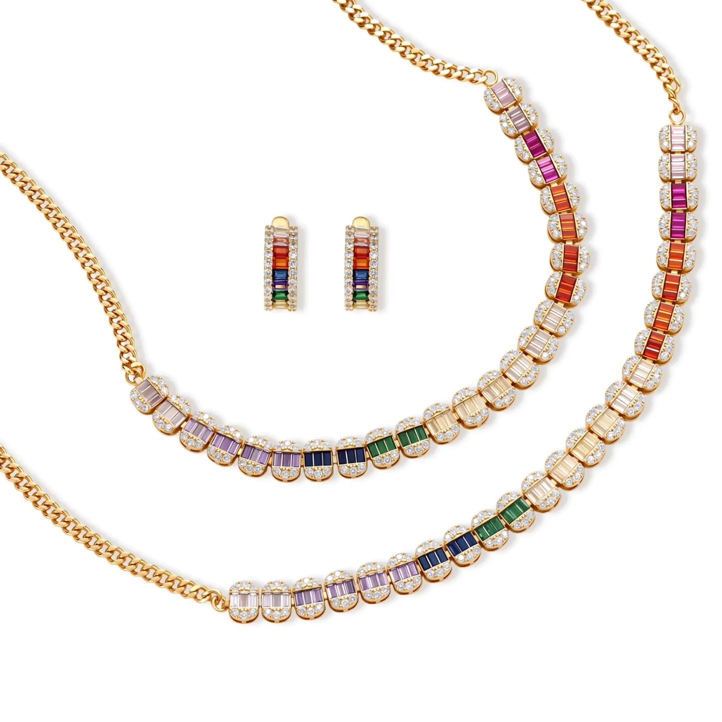 Gold-plated jewelry set featuring rainbow baguette-cut cubic zirconia stones in geometric design on cream background