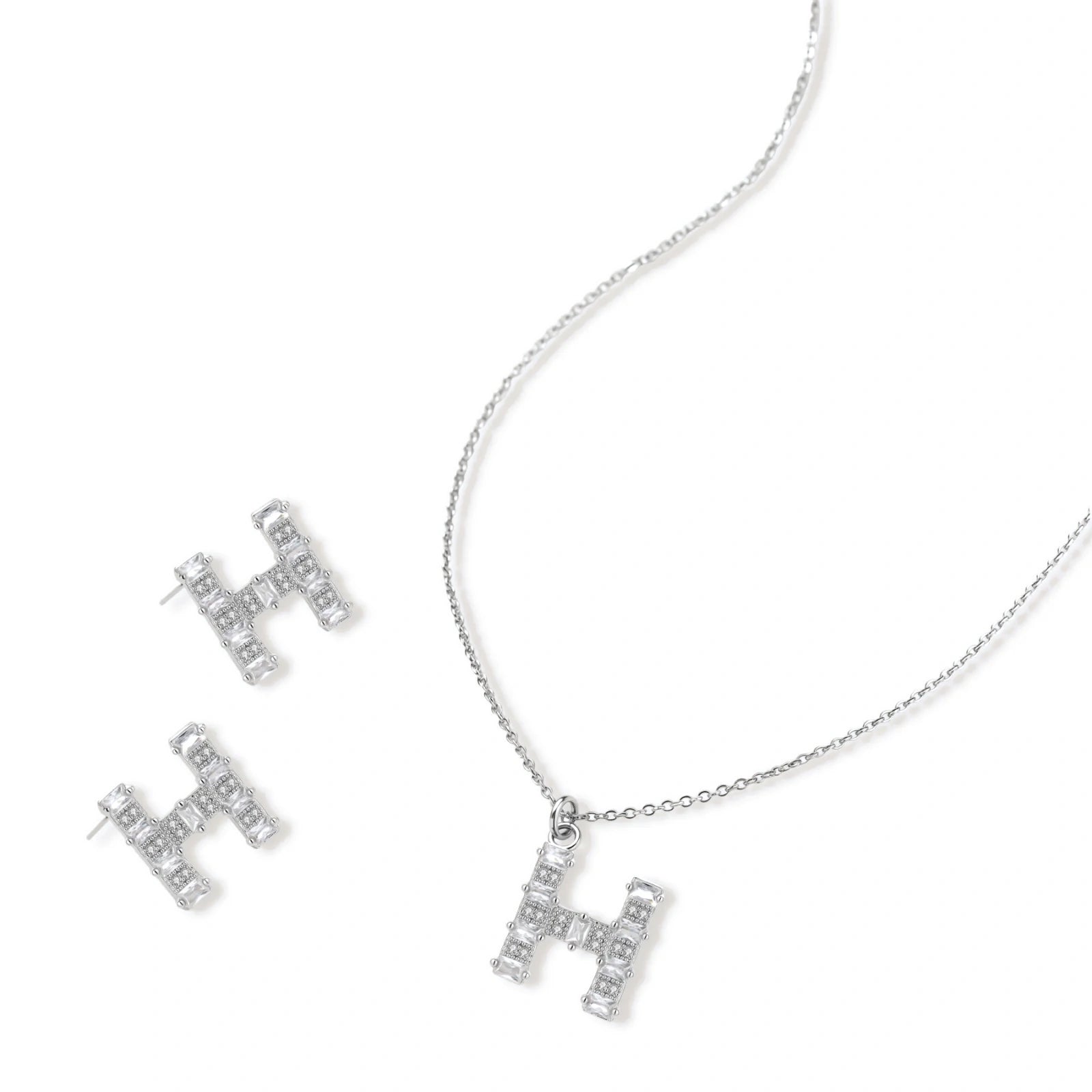 Letter H jewelry set featuring geometric crystal design in gold and white gold plated finish with adjustable chain necklace