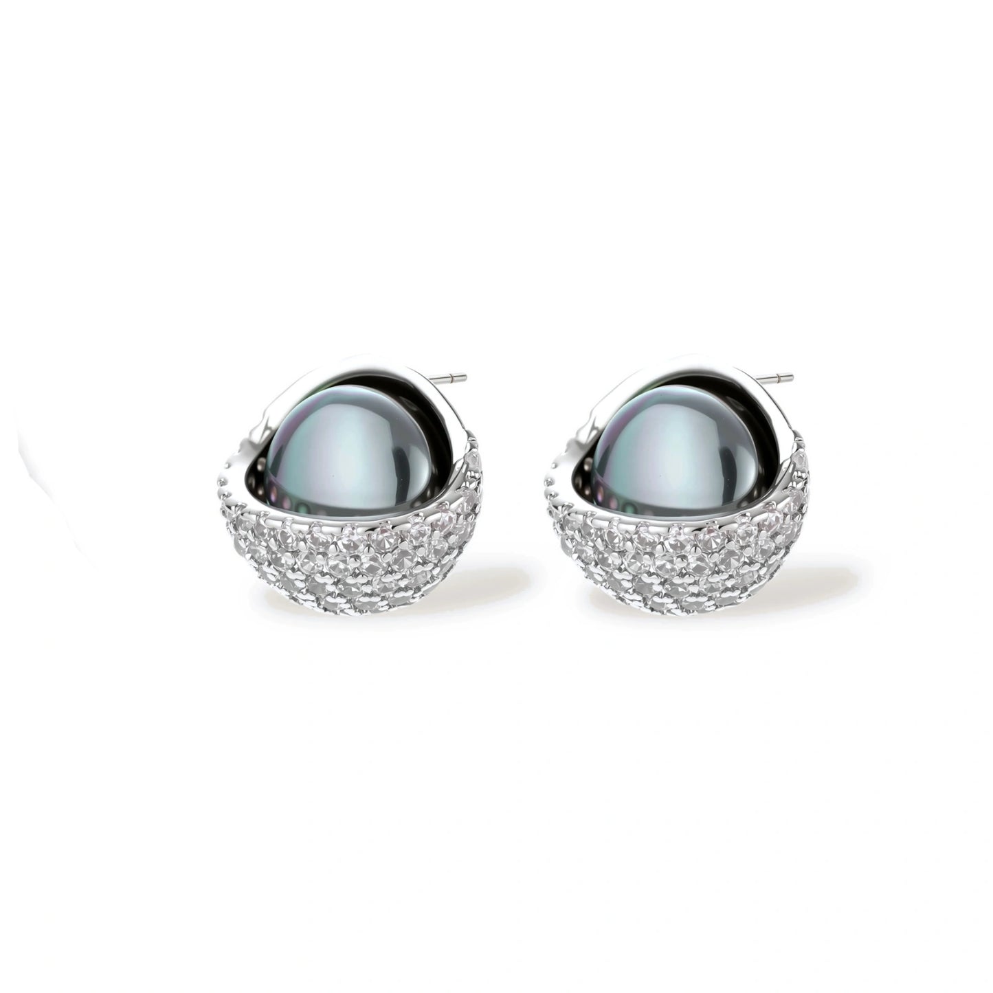 Silver gray Tahitian-style pearl pendant necklace and matching pave zirconia stud earrings set on cream background.