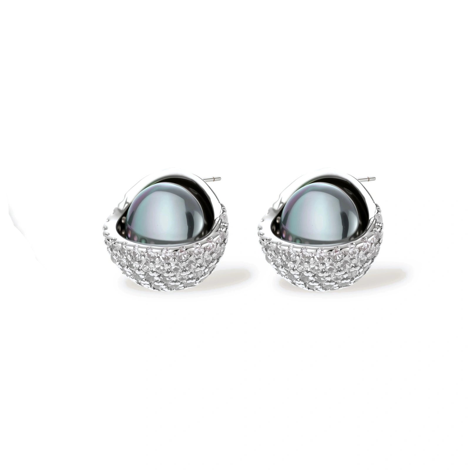 Silver gray Tahitian-style pearl pendant necklace and matching pave zirconia stud earrings set on cream background.