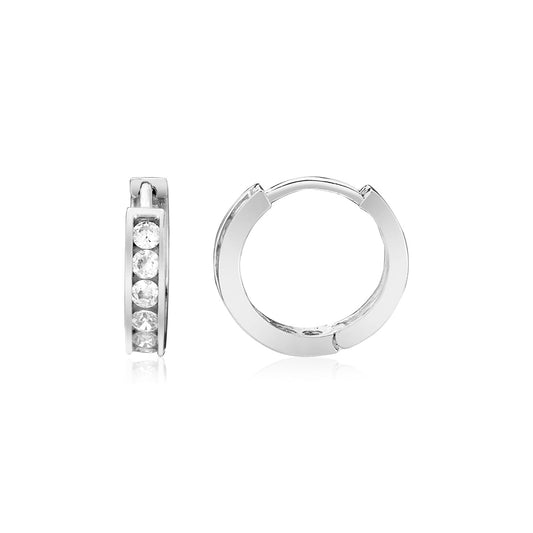 Silver hoop earrings with embedded stones on a white background