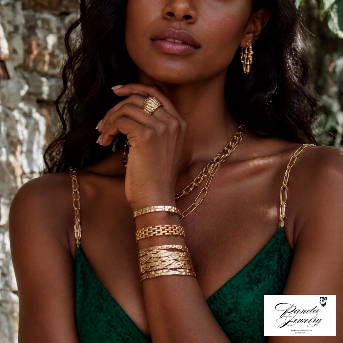 Beautiful lady showing off the multiple bracelets and bangels