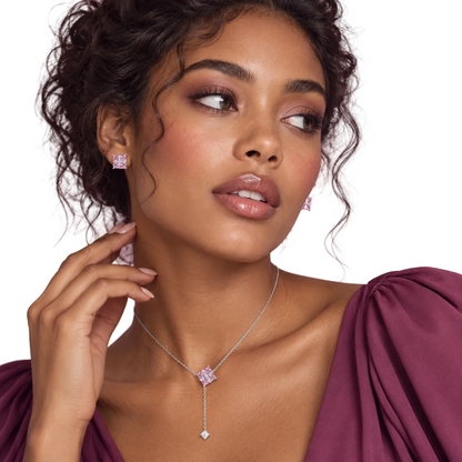 Pink Prism Cross Set featuring sparkling pink square gemstone earrings and a matching silver drop necklace with a delicate clear stone accent.**
