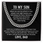 Men's silver or gold Cuban chain with a classic high-polish finish, displayed on a dark background.