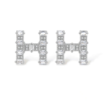 Letter H jewelry set featuring geometric crystal design in gold and white gold plated finish with adjustable chain necklace