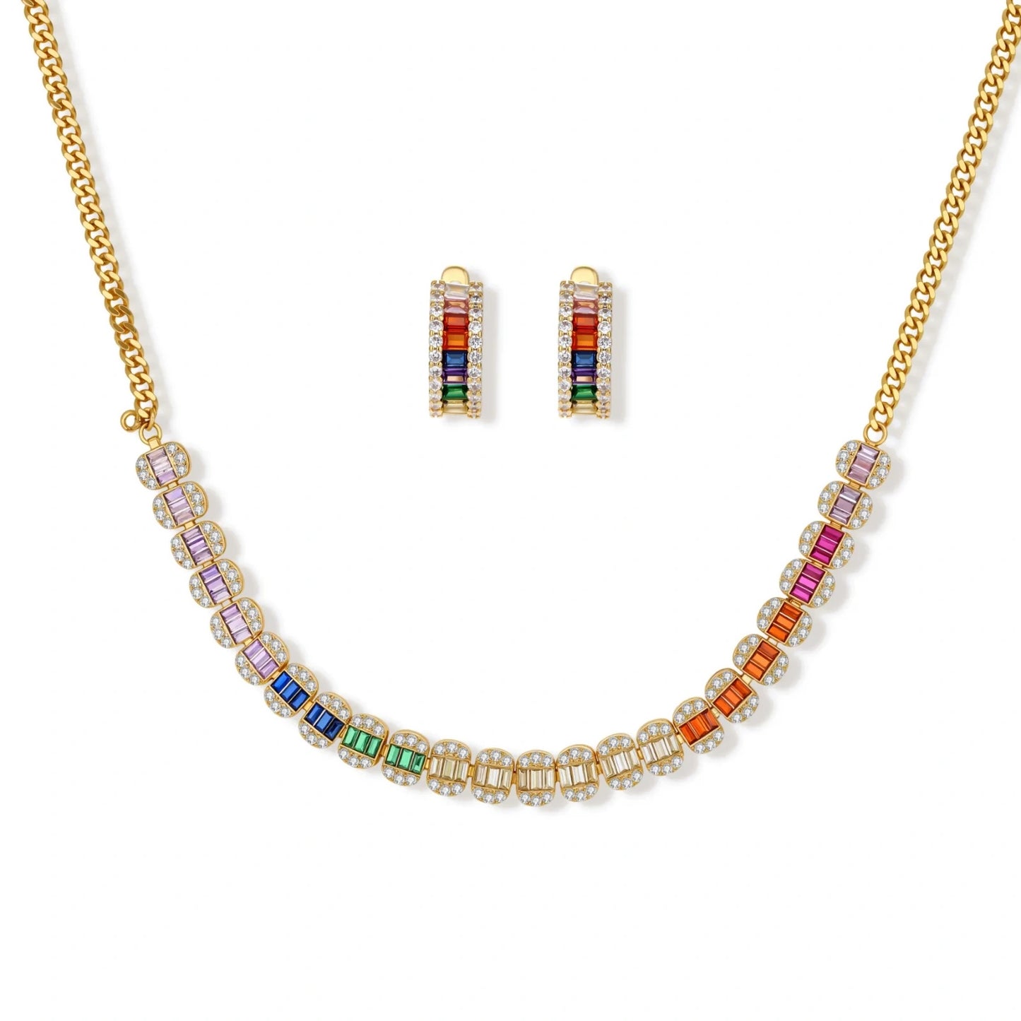 Gold-plated jewelry set featuring rainbow baguette-cut cubic zirconia stones in geometric design on cream background