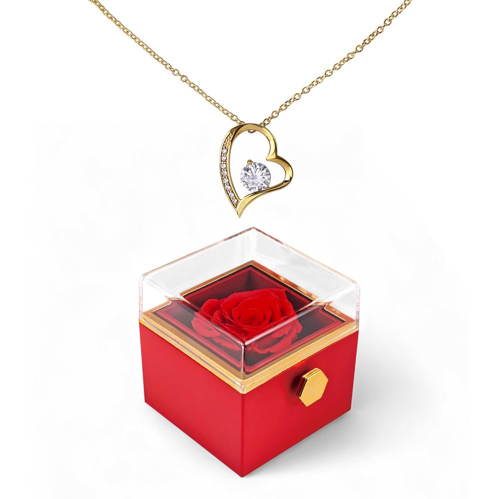 Forever Love heart pendant necklace in 18K yellow gold finish, displayed in a luxury rotating rose gift box