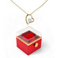 Forever Love heart pendant necklace in 18K yellow gold finish, displayed in a luxury rotating rose gift box