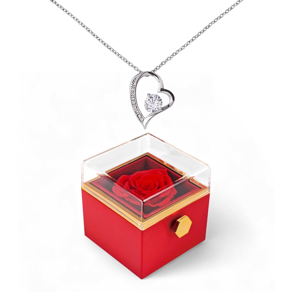 Forever Love heart pendant necklace in white gold finish, displayed in a luxury rotating rose gift box.