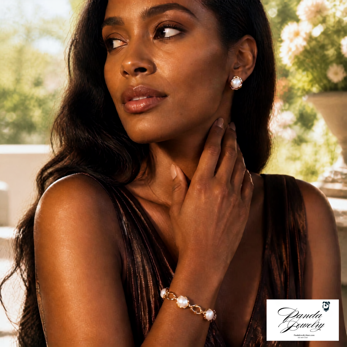 Woman wearing Pearl Embrace Studs with pearl and gold jewelry against a scenic background — freshwater pearl stud earrings in gold-plated setting by Panda Jewelry Store
